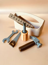 Load image into Gallery viewer, Set of tools including a hammer, wrench, screwdriver, and measuring tape on a beige surface.